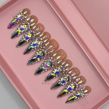 Diamond Frenzy - Long Length 40mm Stiletto Pointy Shape Transparent Nude Base Natural Looking Silver Rhinestone Reusable Acrylic Gel UV High Quality Handmade Luxury Press On Stiletto Nails